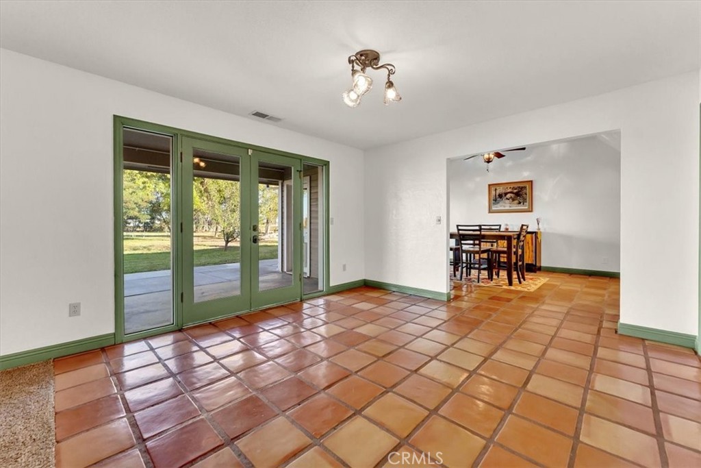 4730 Hall Corning, CA 96021 - Photo 11 of 70 a view of a livingroom with lounge chair and a large window