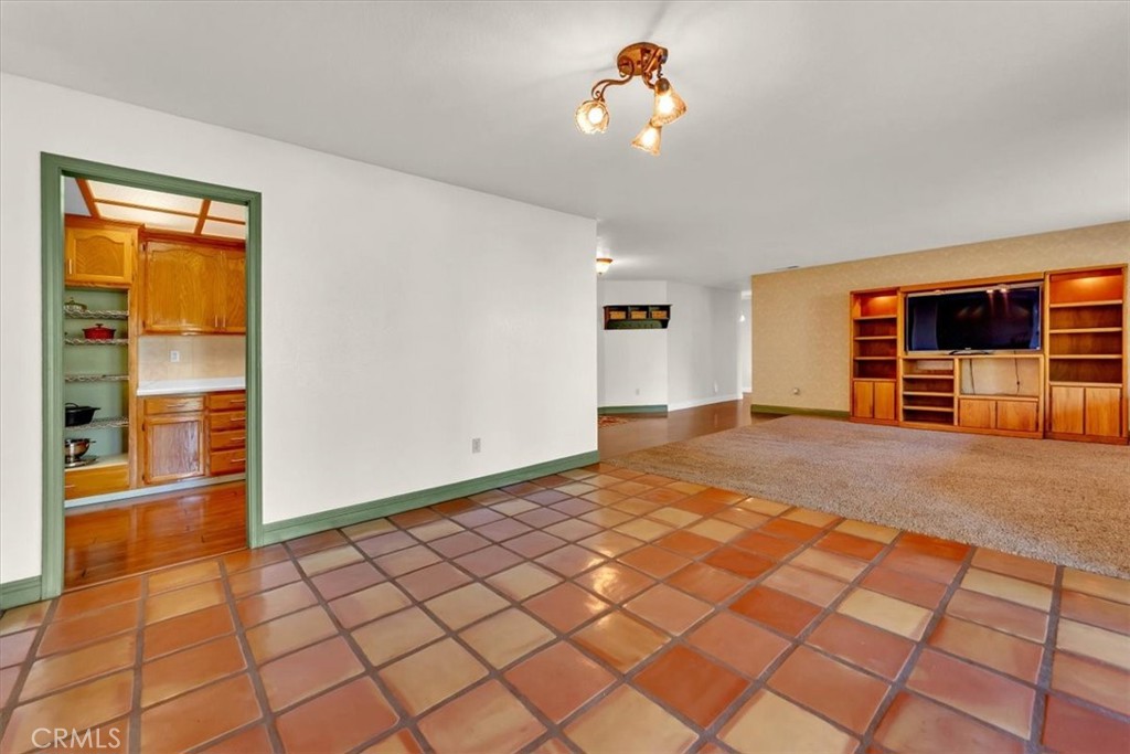 4730 Hall Corning, CA 96021 - Photo 14 of 70 a view of a livingroom with a hardwood and a ceiling fan