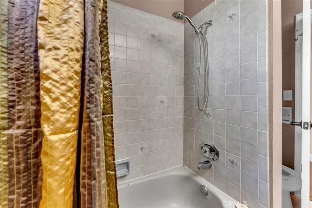 4730 Hall Corning, CA 96021 - Photo 32 of 70 a bathroom with a shower and a bathtub