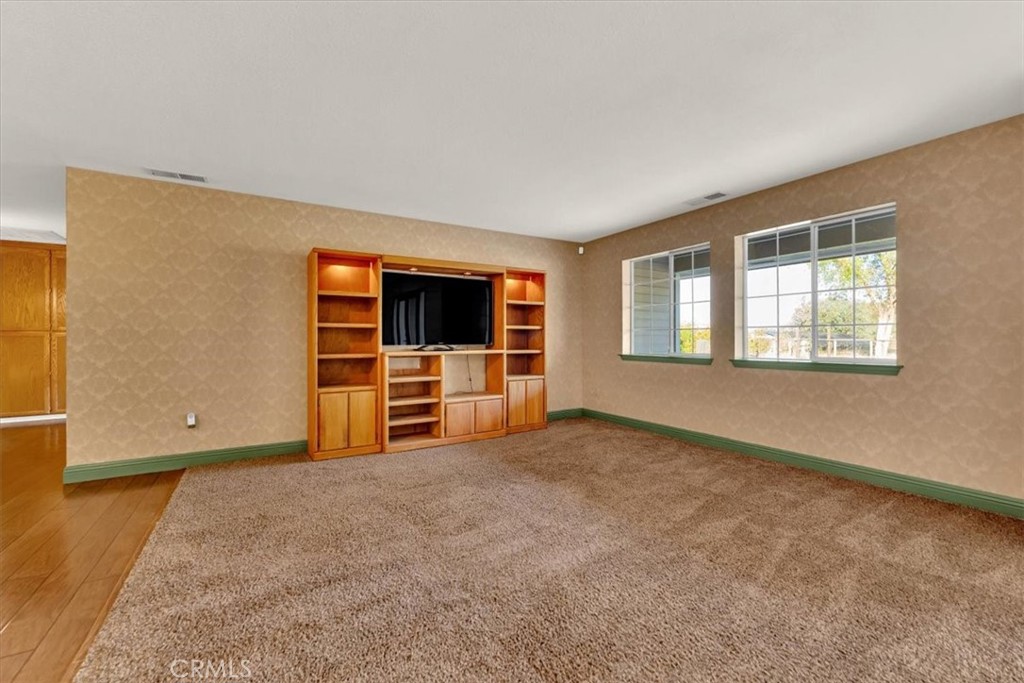 4730 Hall Corning, CA 96021 - Photo 8 of 70 a view of an empty room with a window and a kitchen