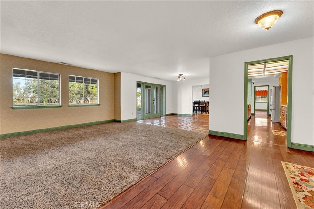 4730 Hall Corning, CA 96021 - Photo 9 of 70 a view of a livingroom with wooden floor and a window