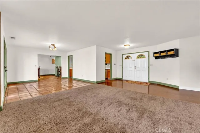 a kitchen with sink and cabinets