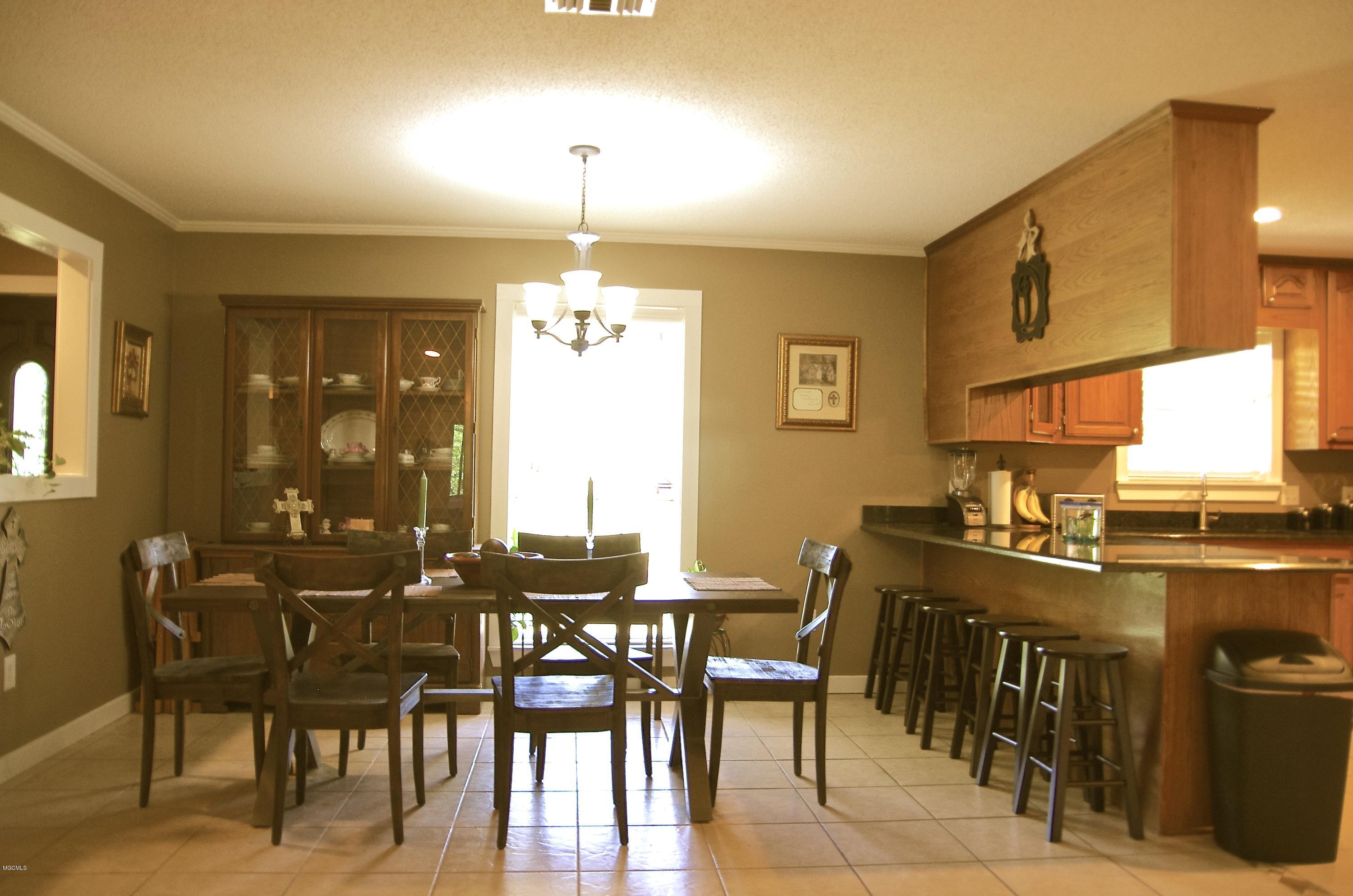 13628 Wolf River Road Gulfport, MS 39503 - Photo 19 of 47 Dining Room/Kitchen