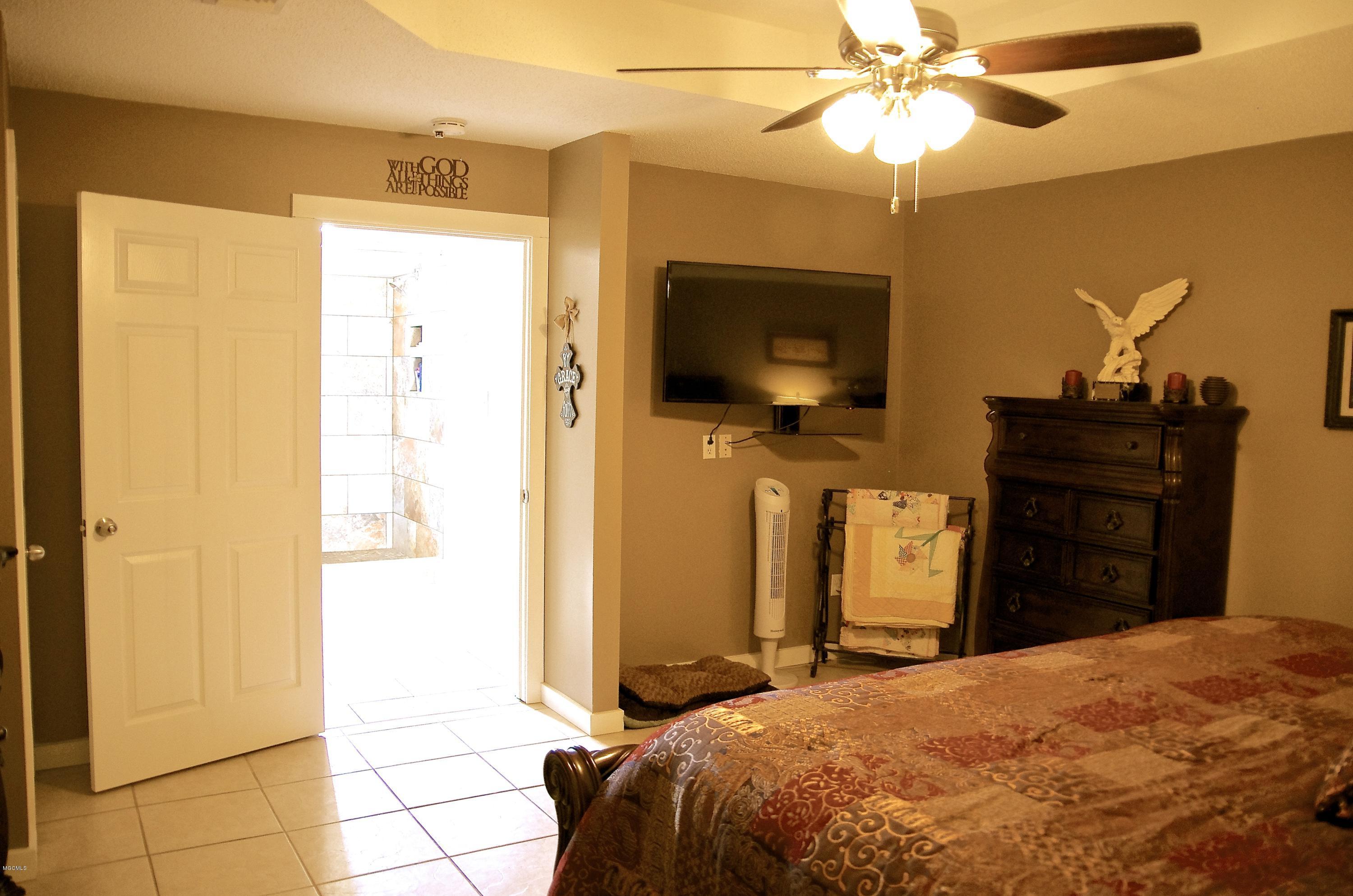 13628 Wolf River Road Gulfport, MS 39503 - Photo 25 of 47 Master Suite