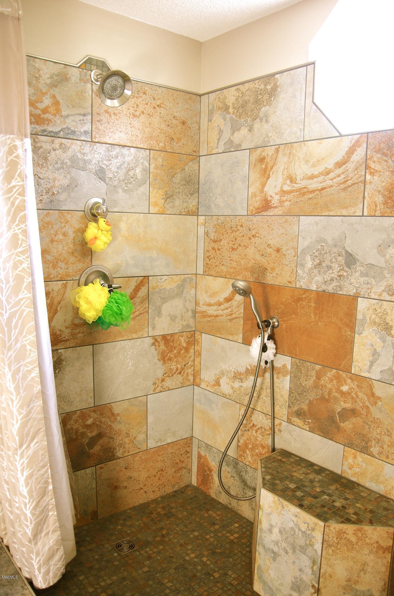 13628 Wolf River Road Gulfport, MS 39503 - Photo 28 of 47 Master Walk in Tile Shower