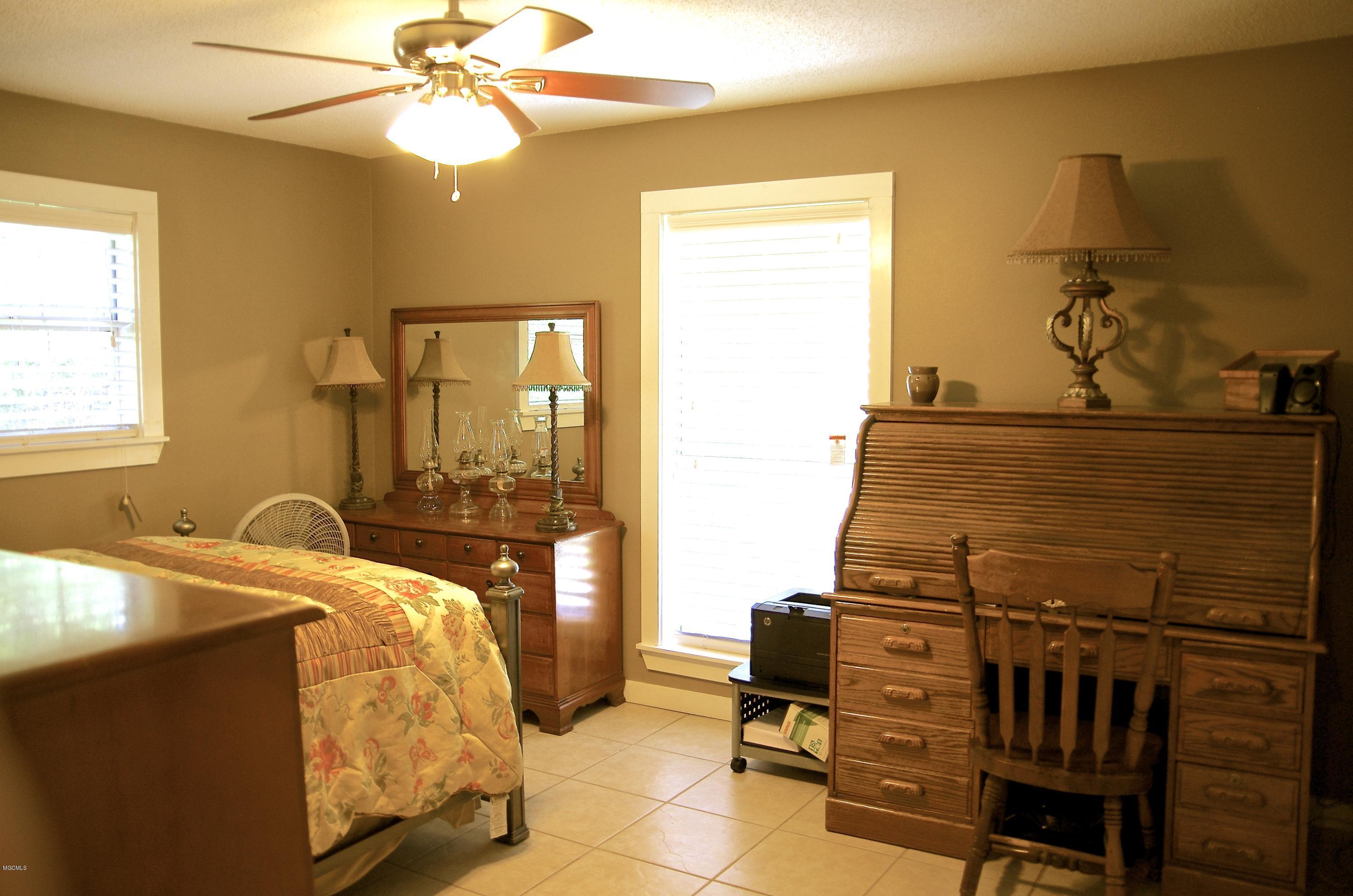 13628 Wolf River Road Gulfport, MS 39503 - Photo 31 of 47 Guest Bedroom