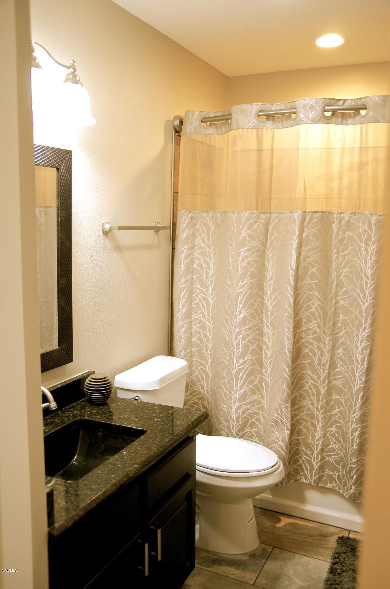 13628 Wolf River Road Gulfport, MS 39503 - Photo 33 of 47 Guest Bath