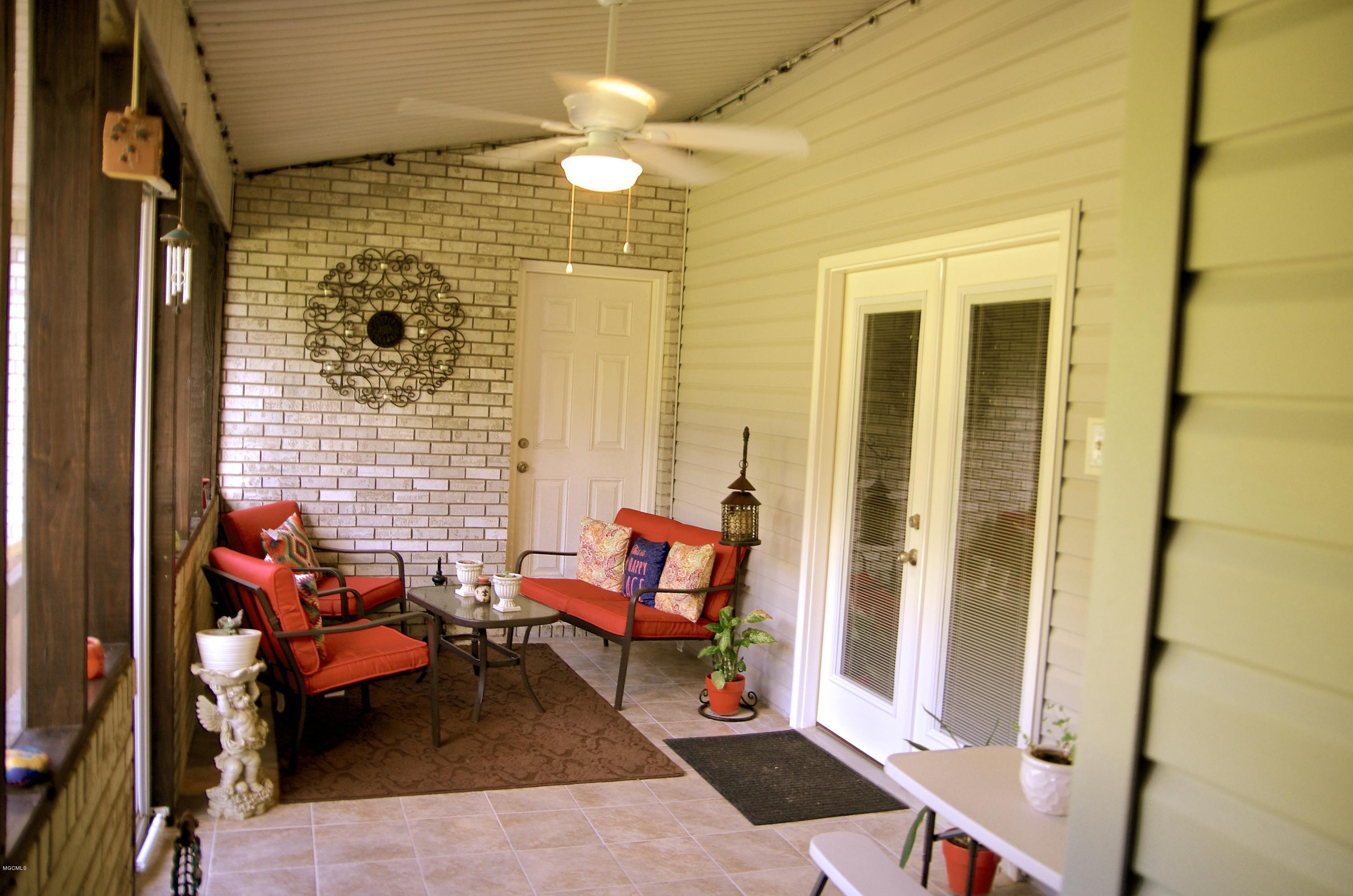 13628 Wolf River Road Gulfport, MS 39503 - Photo 36 of 47 Enclosed Covered Back Porch
