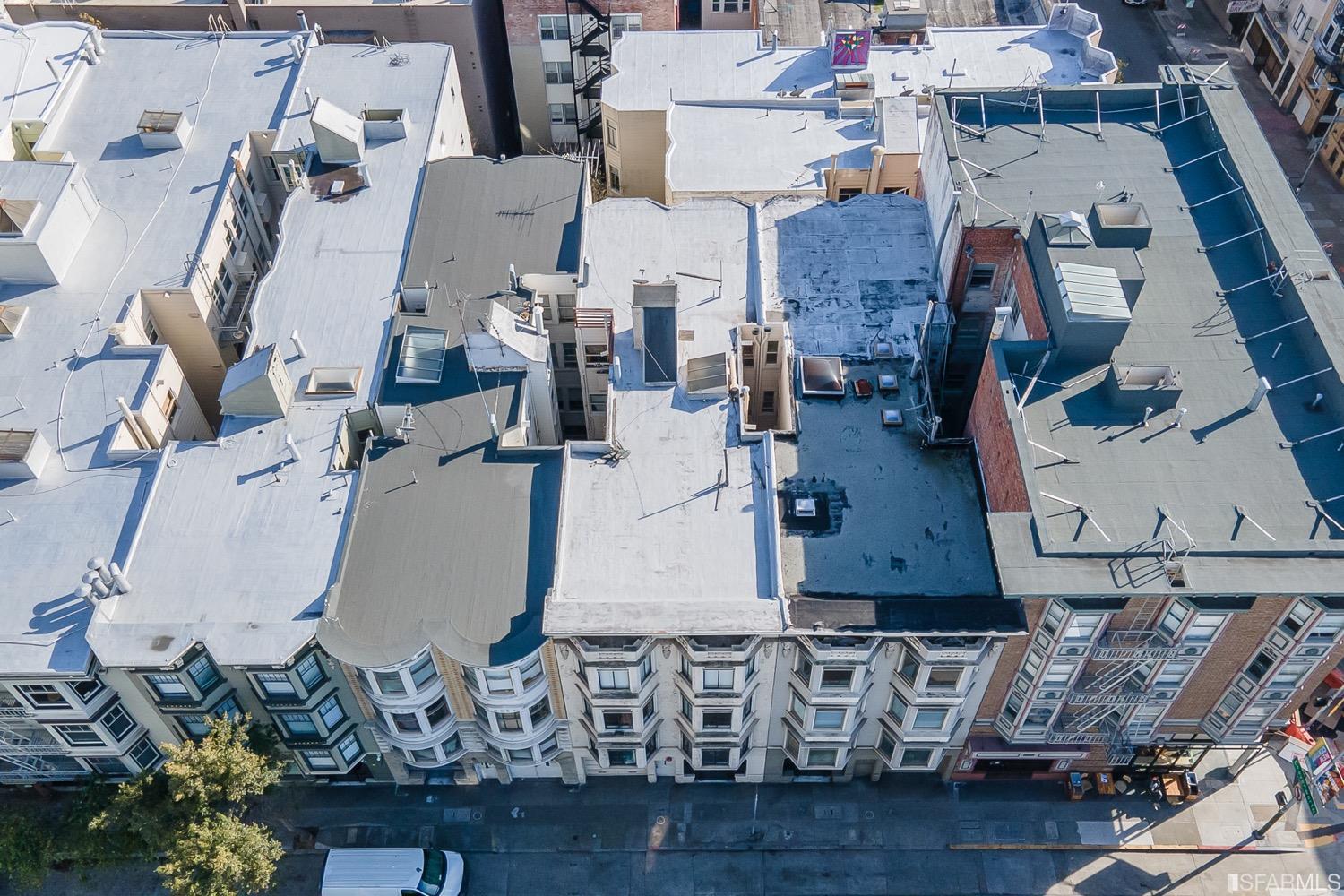 1175 Pine Street San Francisco, CA 94109 - Photo 6 of 22 an aerial view of residential houses with outdoor space