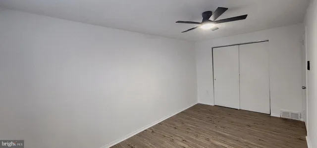 a view of a big room with wooden floor