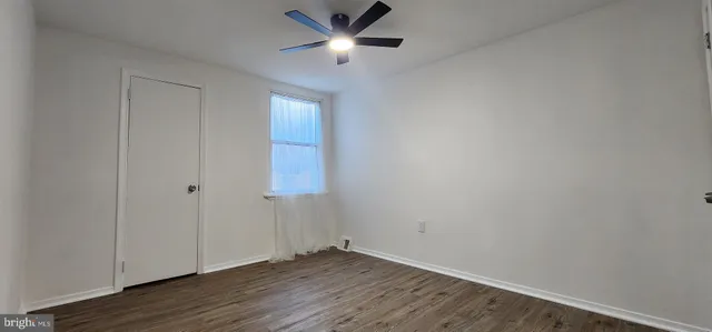 a view of a livingroom with a hardwood floor