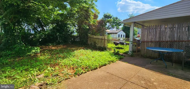 a front view of a building with garden