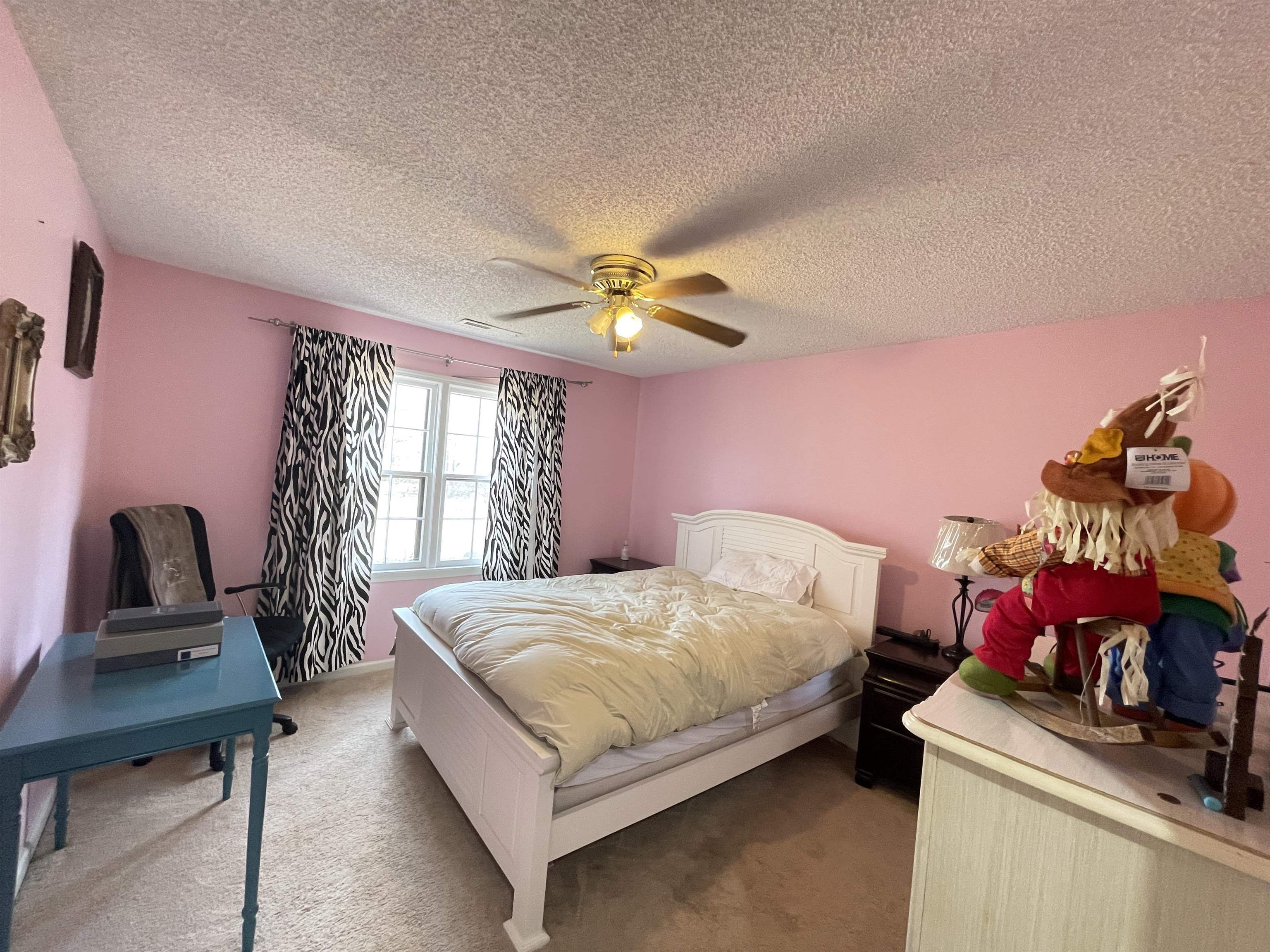 4580 Shadowlawn Road Bartlett, TN 38002 - Photo 24 of 37 a bedroom with a bed and a window