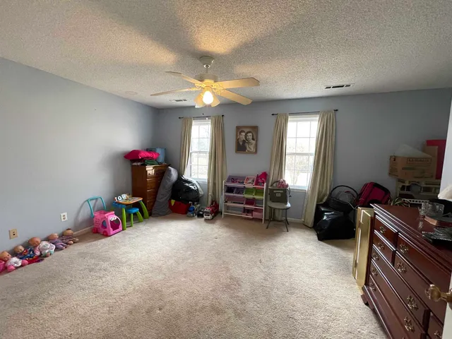 a view of a livingroom with toys