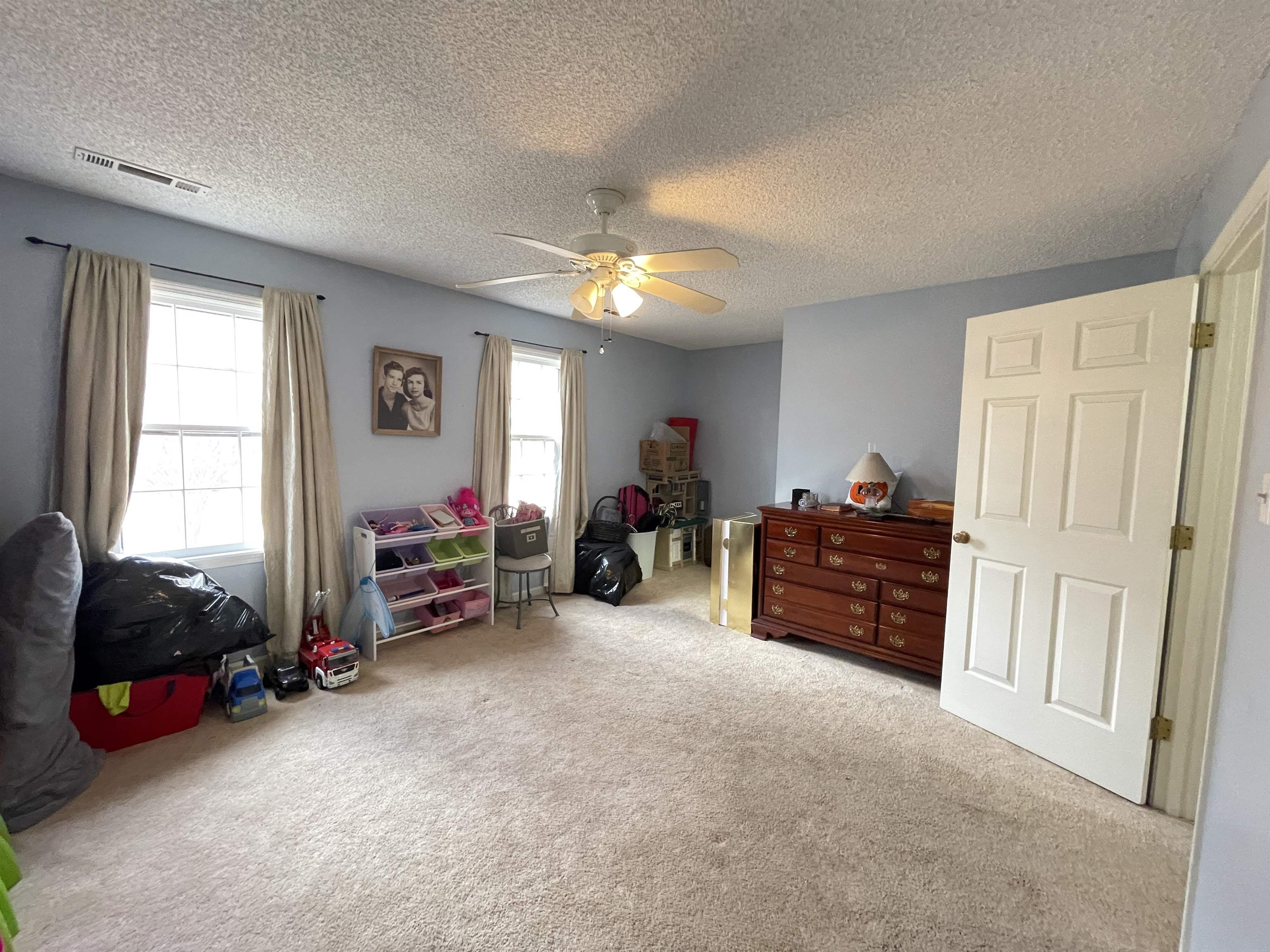4580 Shadowlawn Road Bartlett, TN 38002 - Photo 26 of 37 a living room with furniture and a window