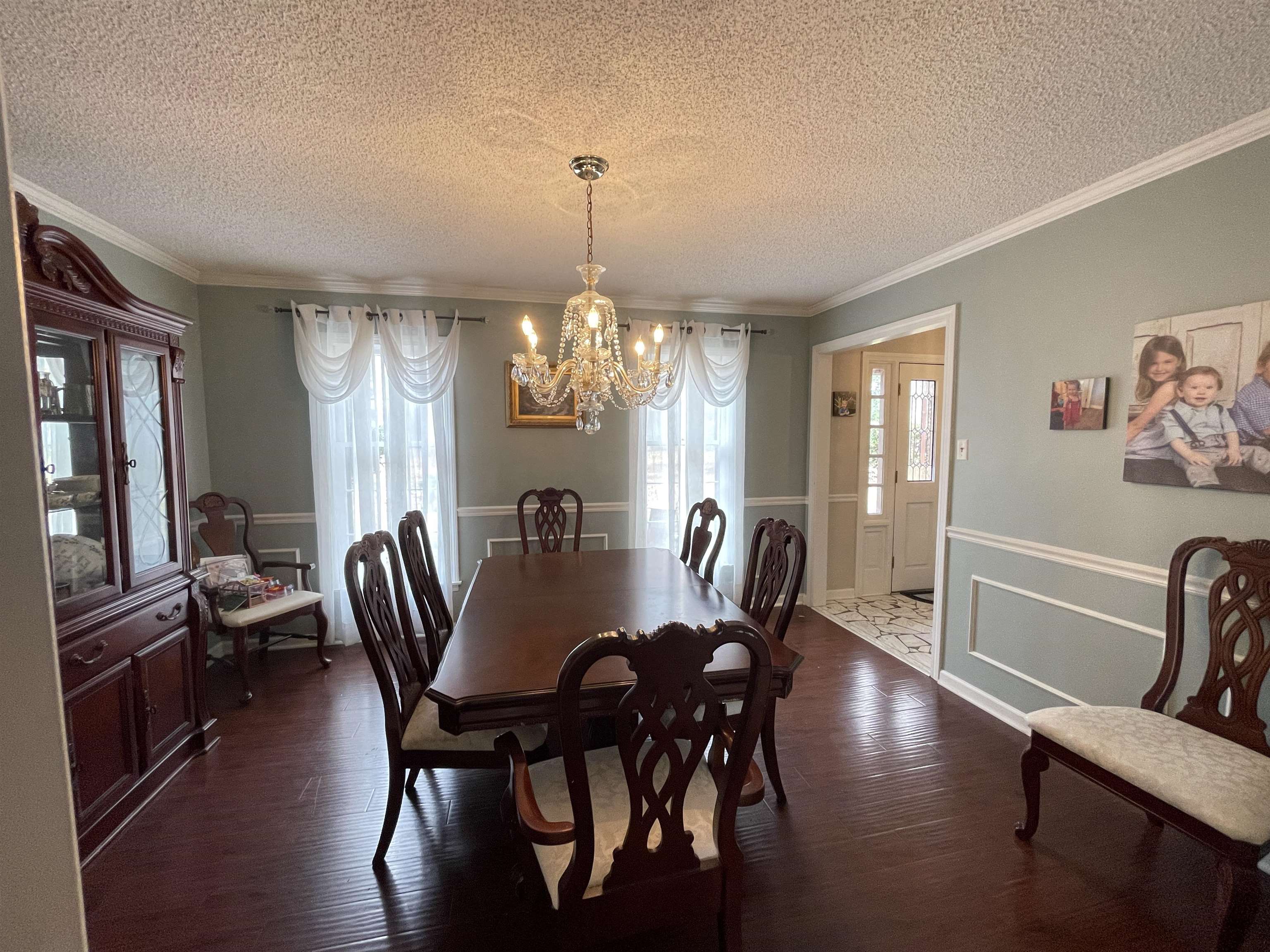 4580 Shadowlawn Road Bartlett, TN 38002 - Photo 6 of 37 a view of a dining room with furniture window and wooden floor