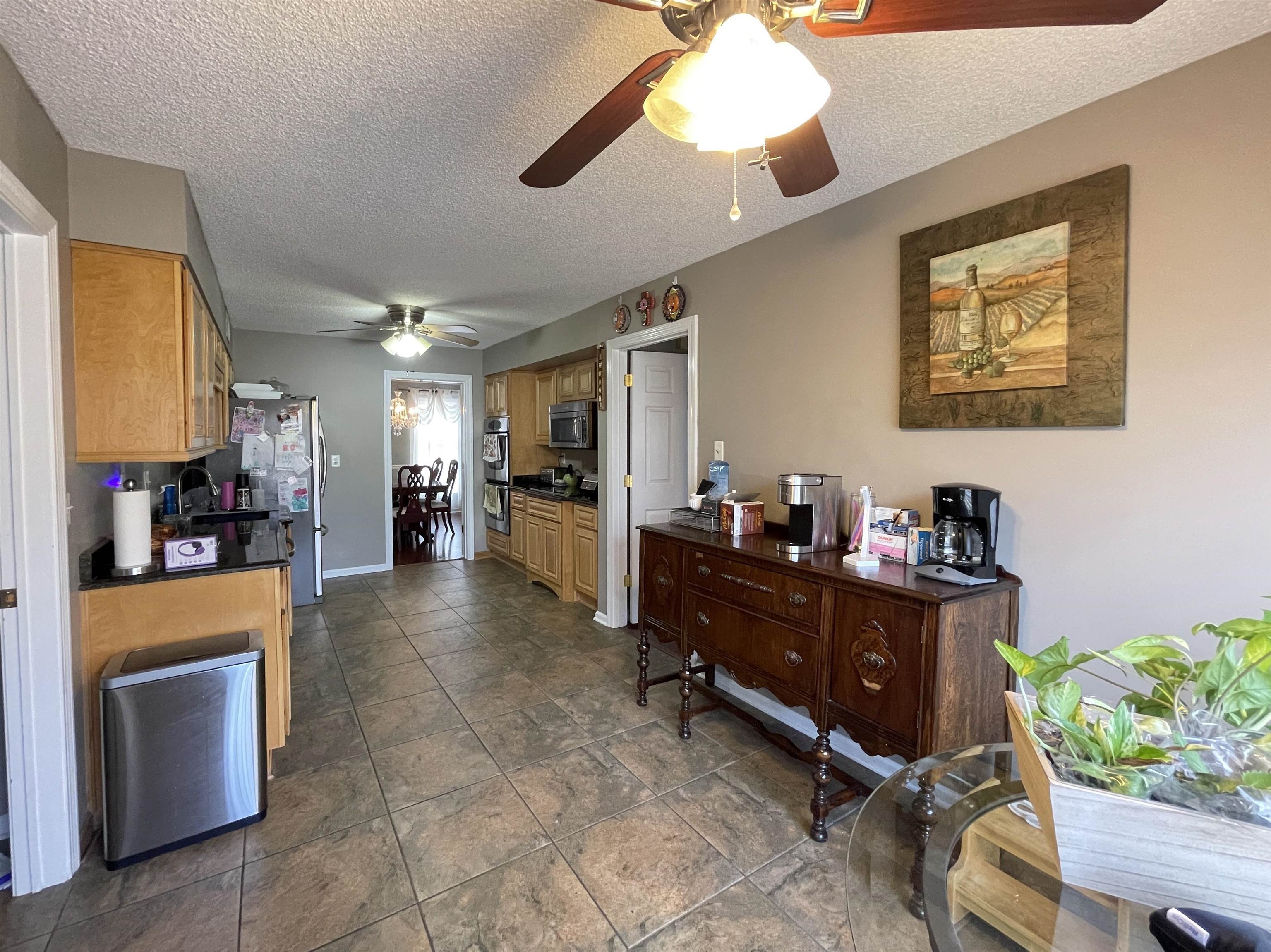 4580 Shadowlawn Road Bartlett, TN 38002 - Photo 10 of 37 a living room with furniture and a flat screen tv