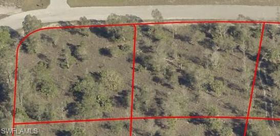 308 Jourferie Road Lehigh Acres, FL 33974 - Photo 4 of 4 a bathroom with a shower and a sink