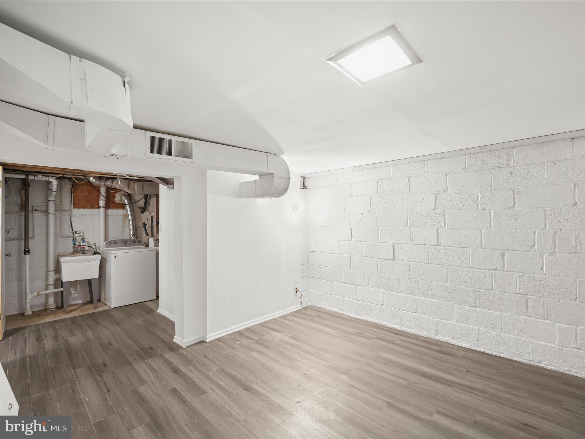 5545 Bass Place Southeast Washington, DC 20019 - Photo 20 of 35 a view of empty room with wooden floor and fan