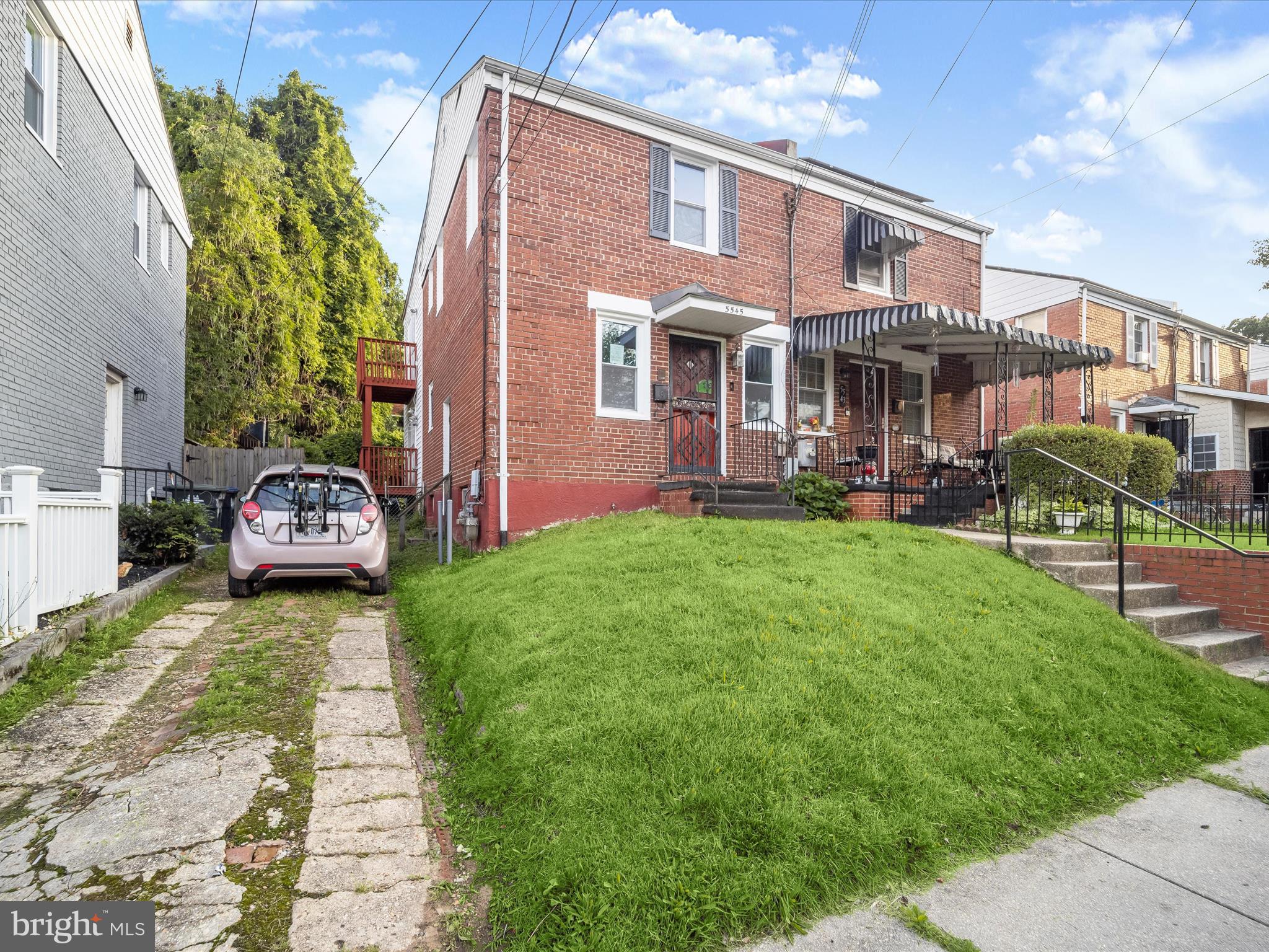 5545 Bass Place Southeast Washington, DC 20019 - Photo 31 of 35 a front view of a house with garden