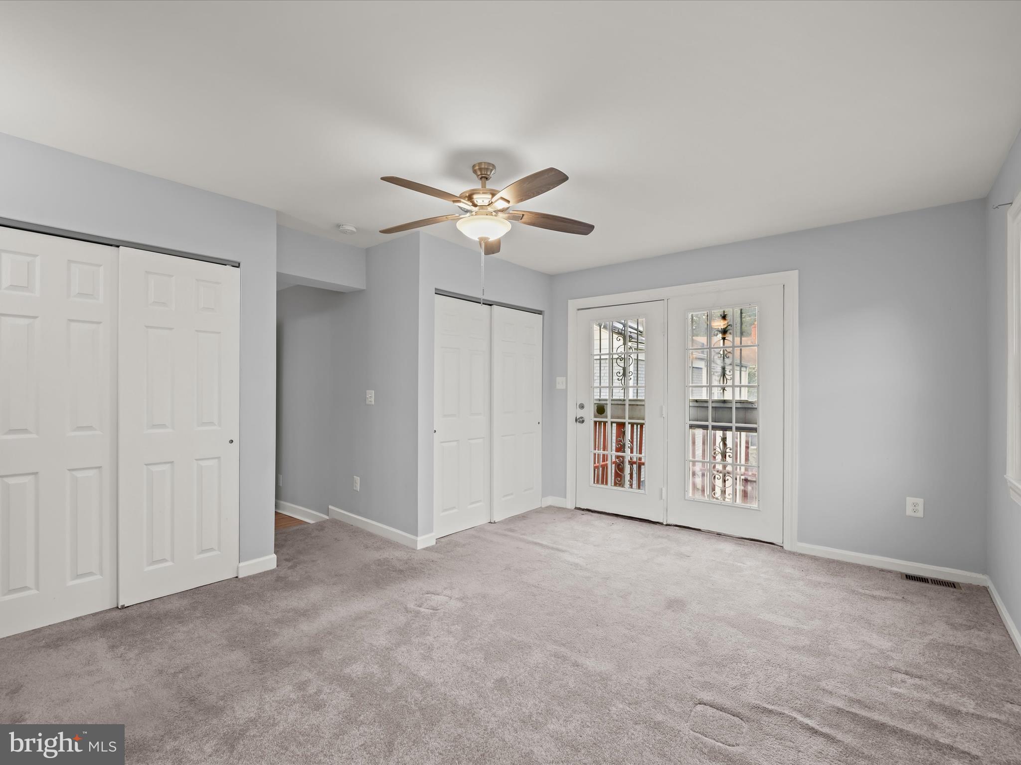 5545 Bass Place Southeast Washington, DC 20019 - Photo 10 of 35 a view of an empty room with a ceiling fan