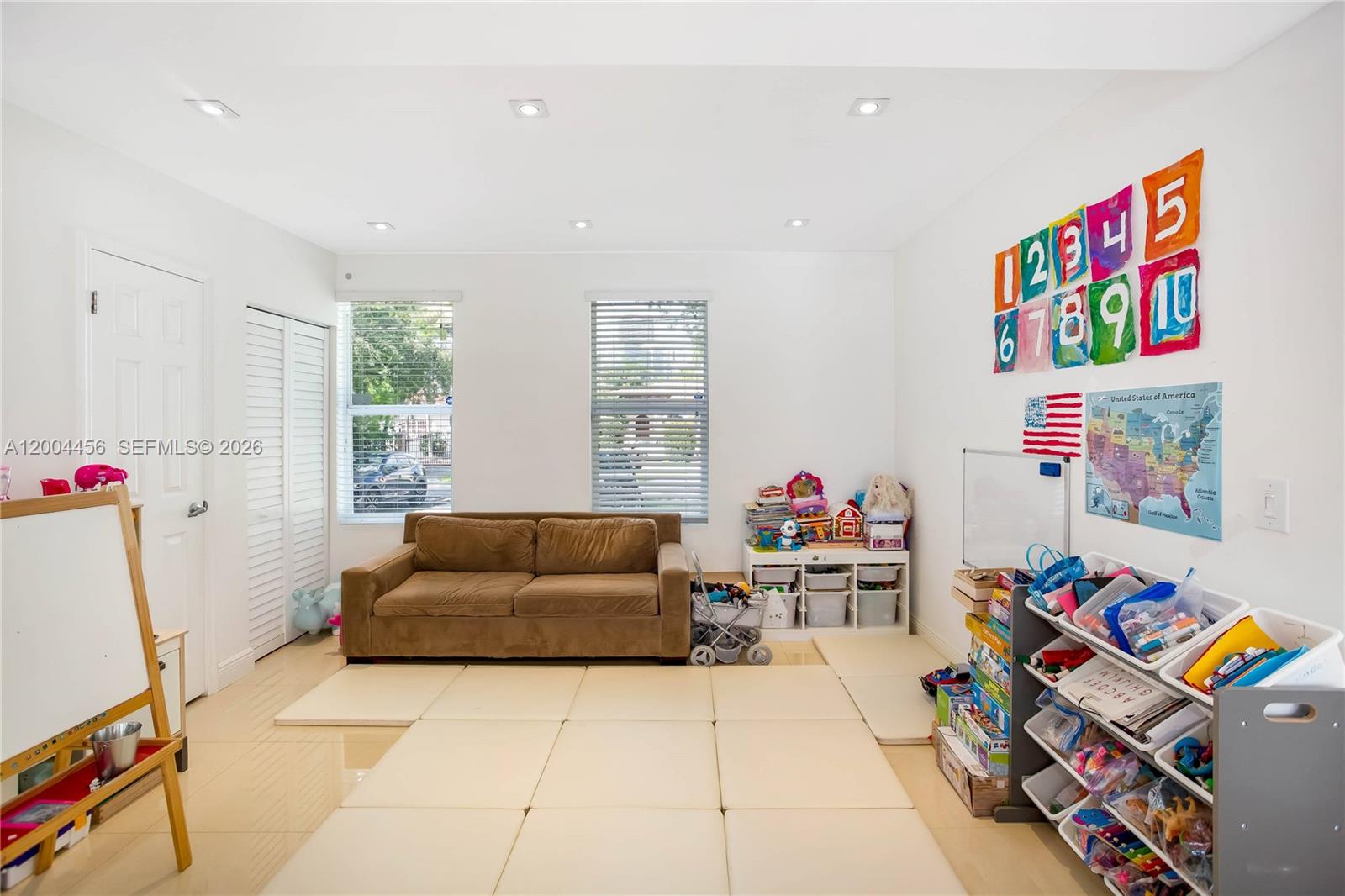 152 Southwest 20th Road Miami, FL 33129 - Photo 14 of 22 a living room with furniture and a window