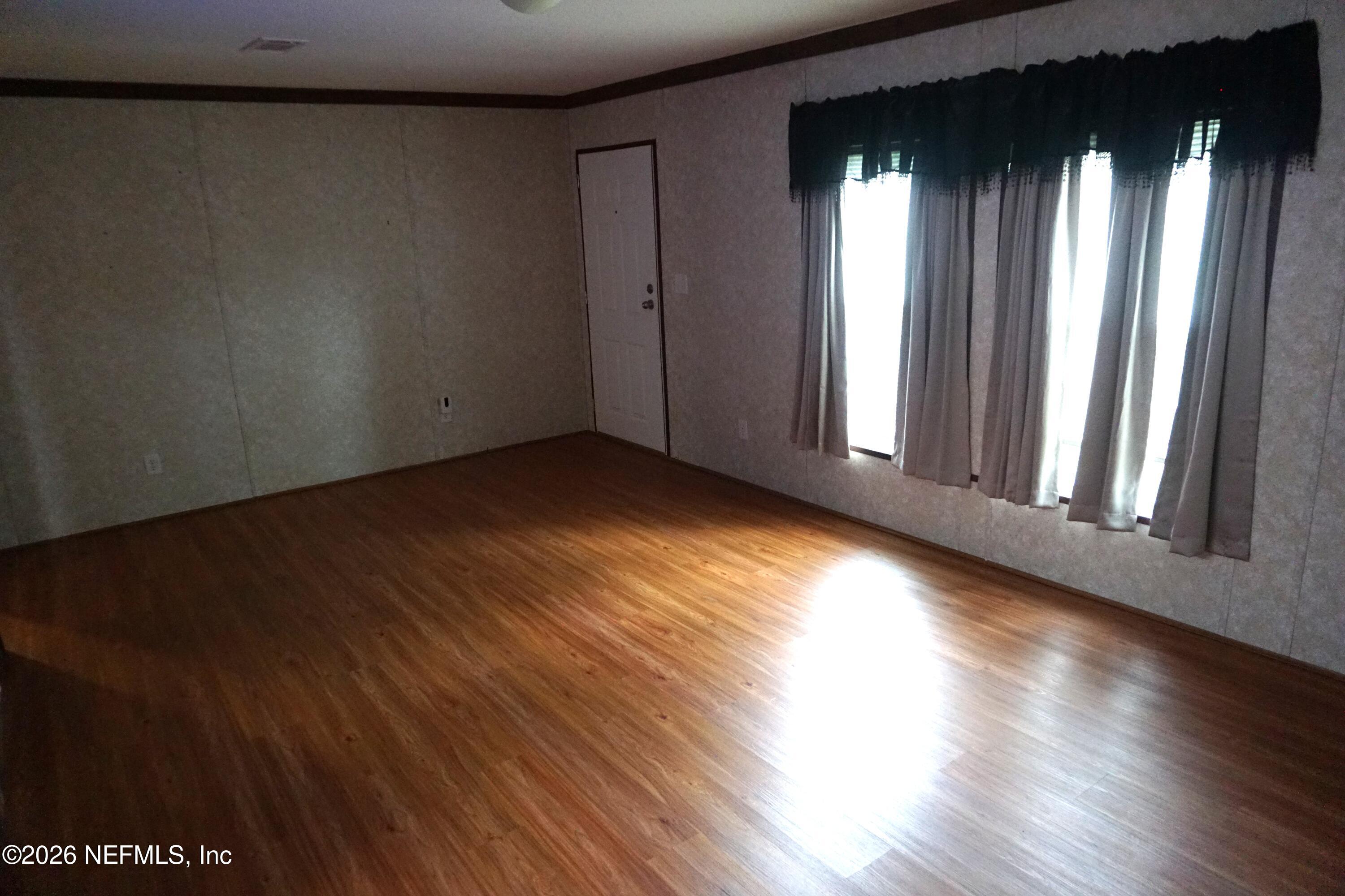 12240 Northwest 225th Road, Unit COUNTY Starke, FL 32091 - Photo 7 of 19 Living Room