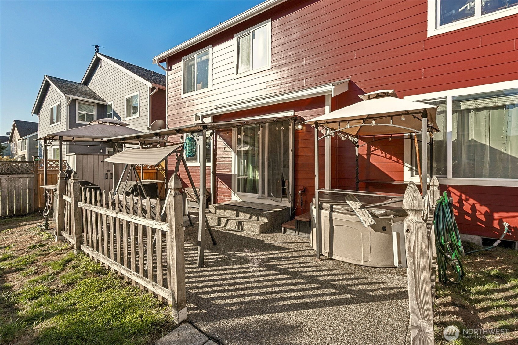 7074 Inlay Street Southeast Lacey, WA 98513 - Photo 25 of 28 a view of a house with wooden deck