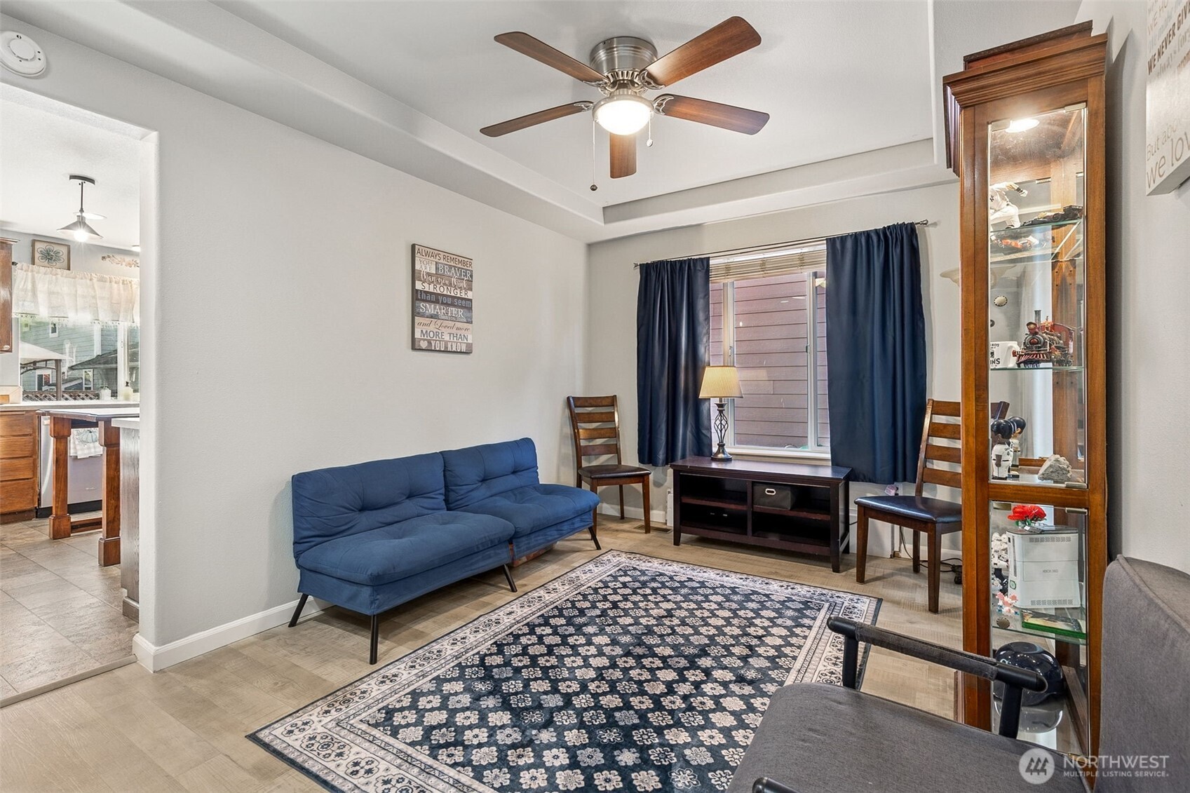 7074 Inlay Street Southeast Lacey, WA 98513 - Photo 9 of 28 a living room with furniture and a window