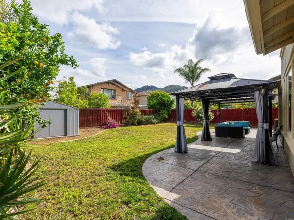 a house view with a garden space