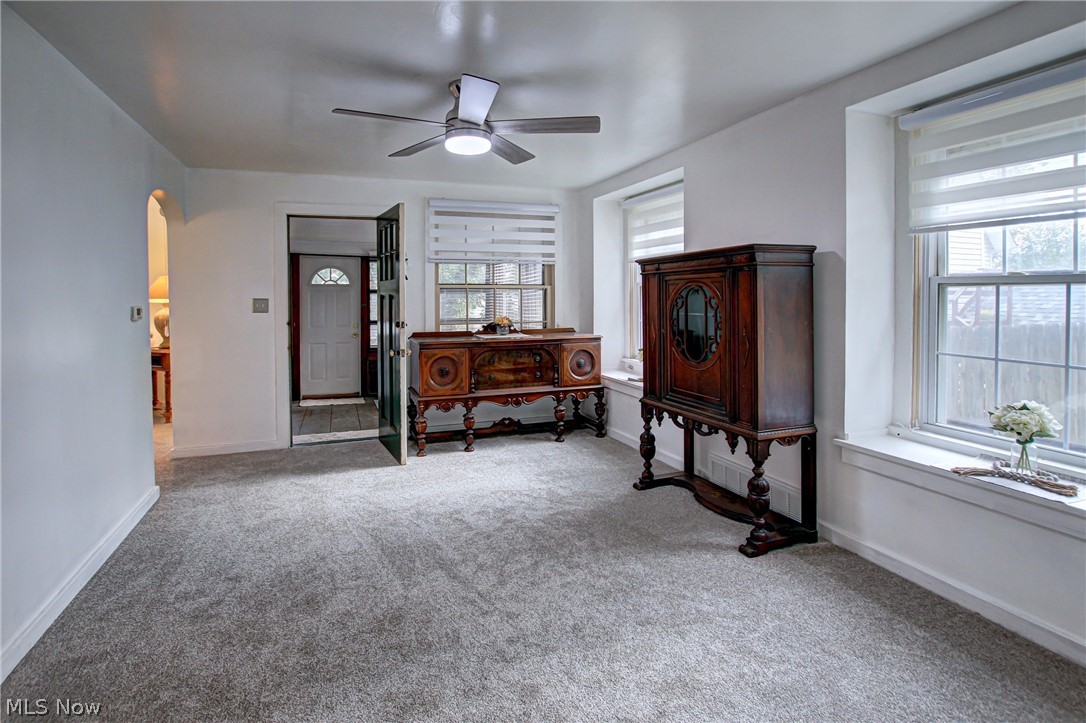 688 Wooster Road North Barberton, OH 44203 - Photo 11 of 47 Living room featuring carpet flooring, plenty of natural light, and ceiling fan