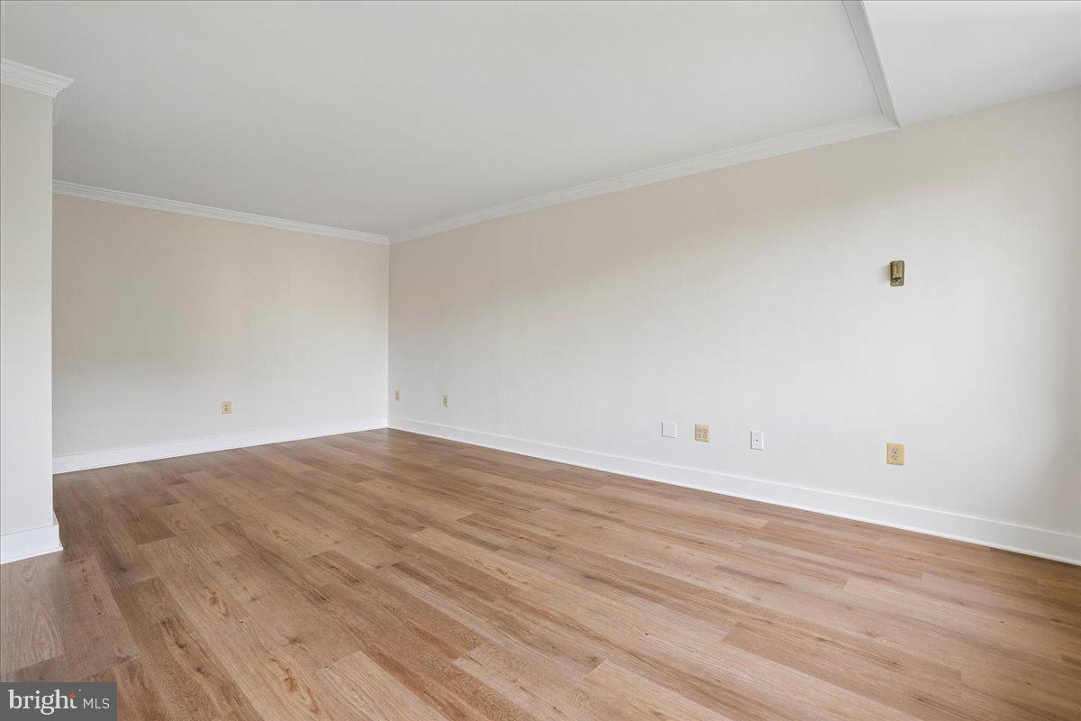 4000 Tunlaw Road Northwest, Unit 1003 Washington, DC 20007 - Photo 7 of 25 Spacious, sunlit room awaits your touch.