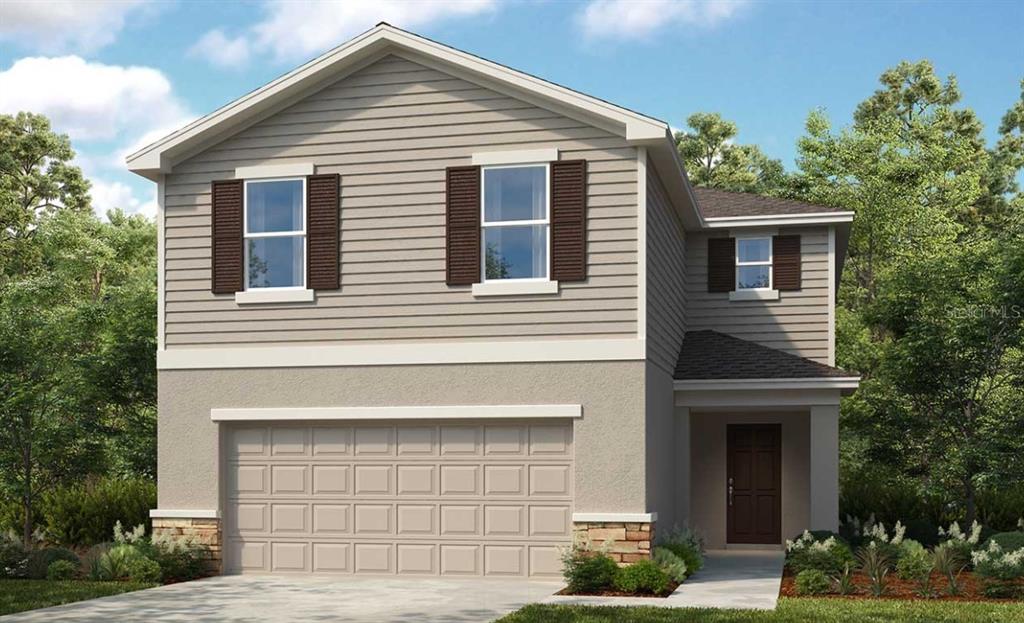 4525 Ranunculus St Lake Haines City, FL 33844 - Photo 1 of 1 a front view of a house with garden