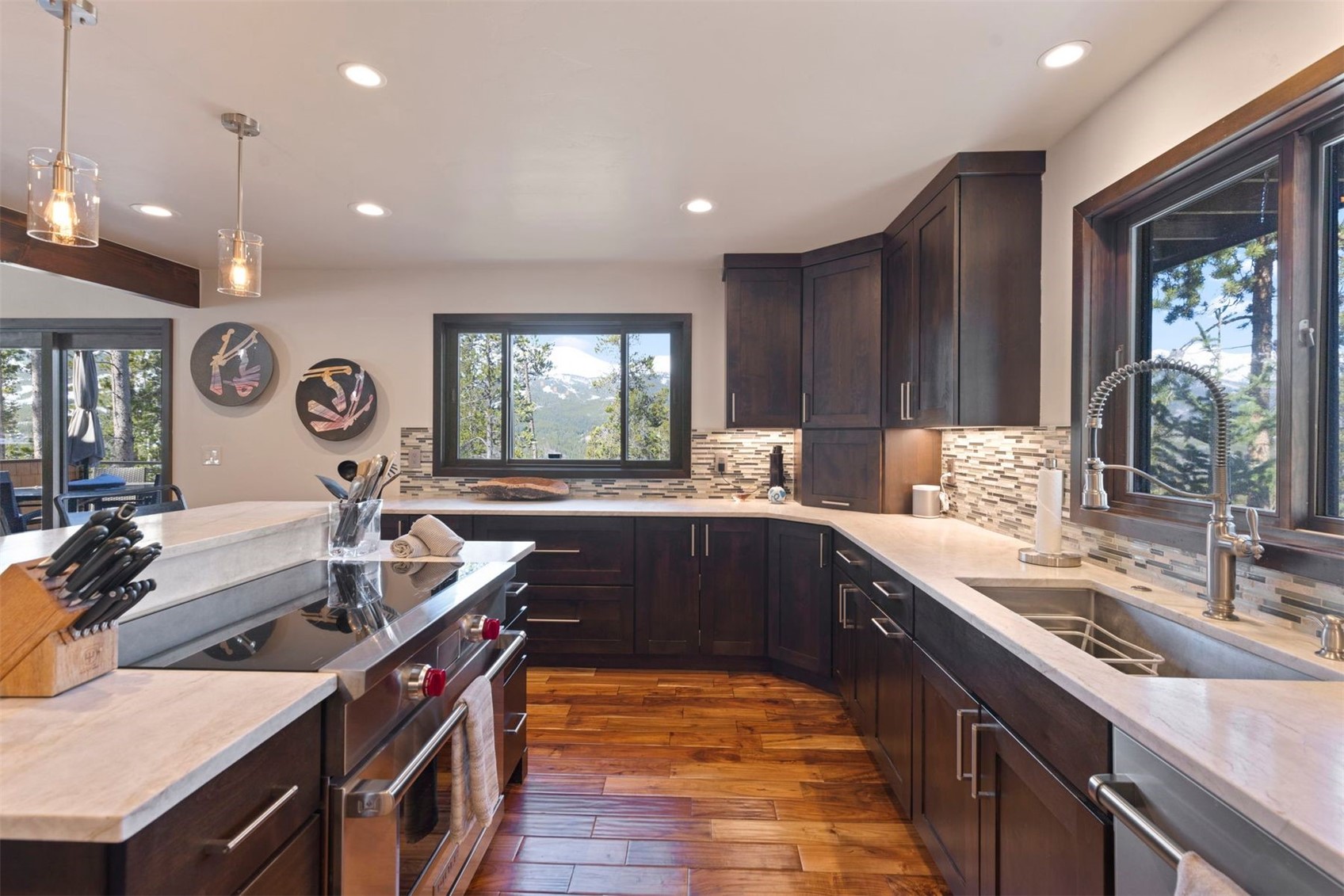 103 Bearing Tree Road Breckenridge, CO 80424 - Photo 13 of 30 a kitchen with stainless steel appliances granite countertop a sink stove and cabinets
