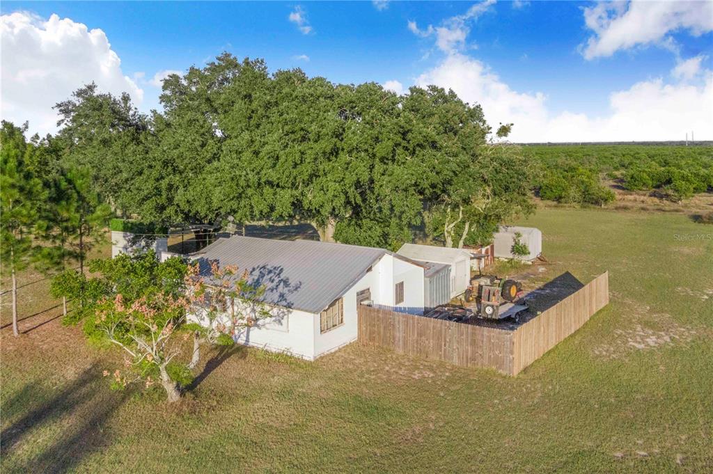 1114 H L Smith Road Haines City, FL 33844 - Photo 2 of 21 a view of a lake with couches
