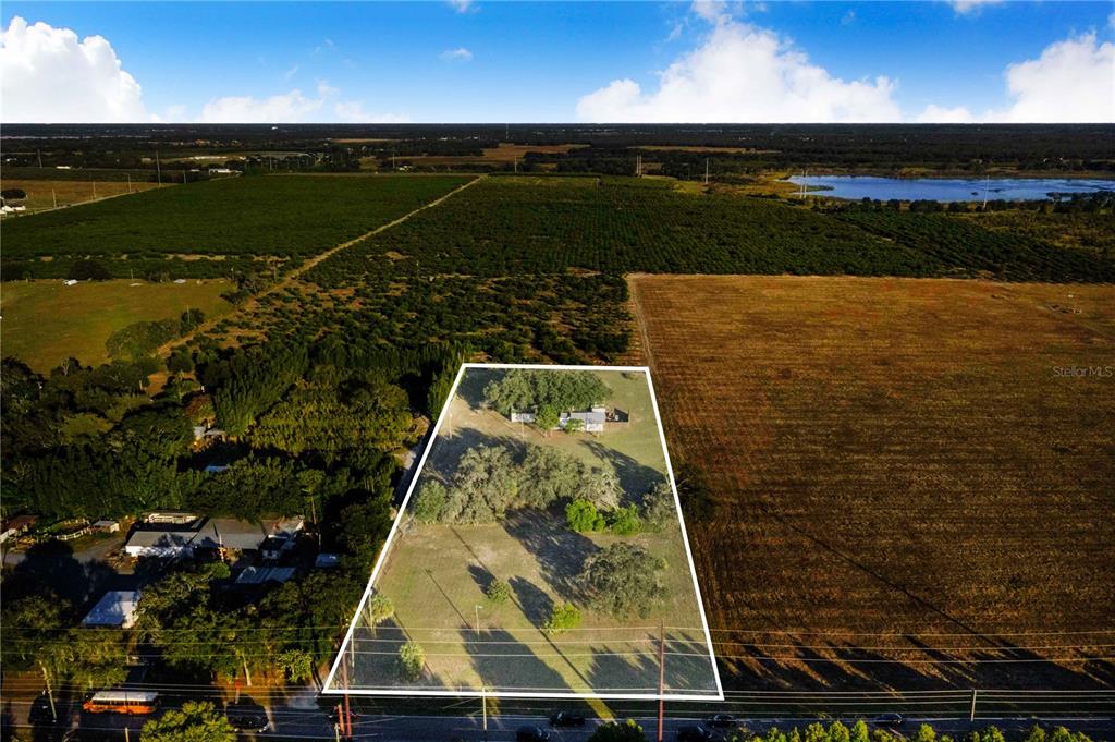 1114 H L Smith Road Haines City, FL 33844 - Photo 21 of 21 a view of a back yard