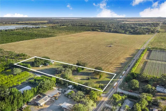 a view of a lake with a big yard