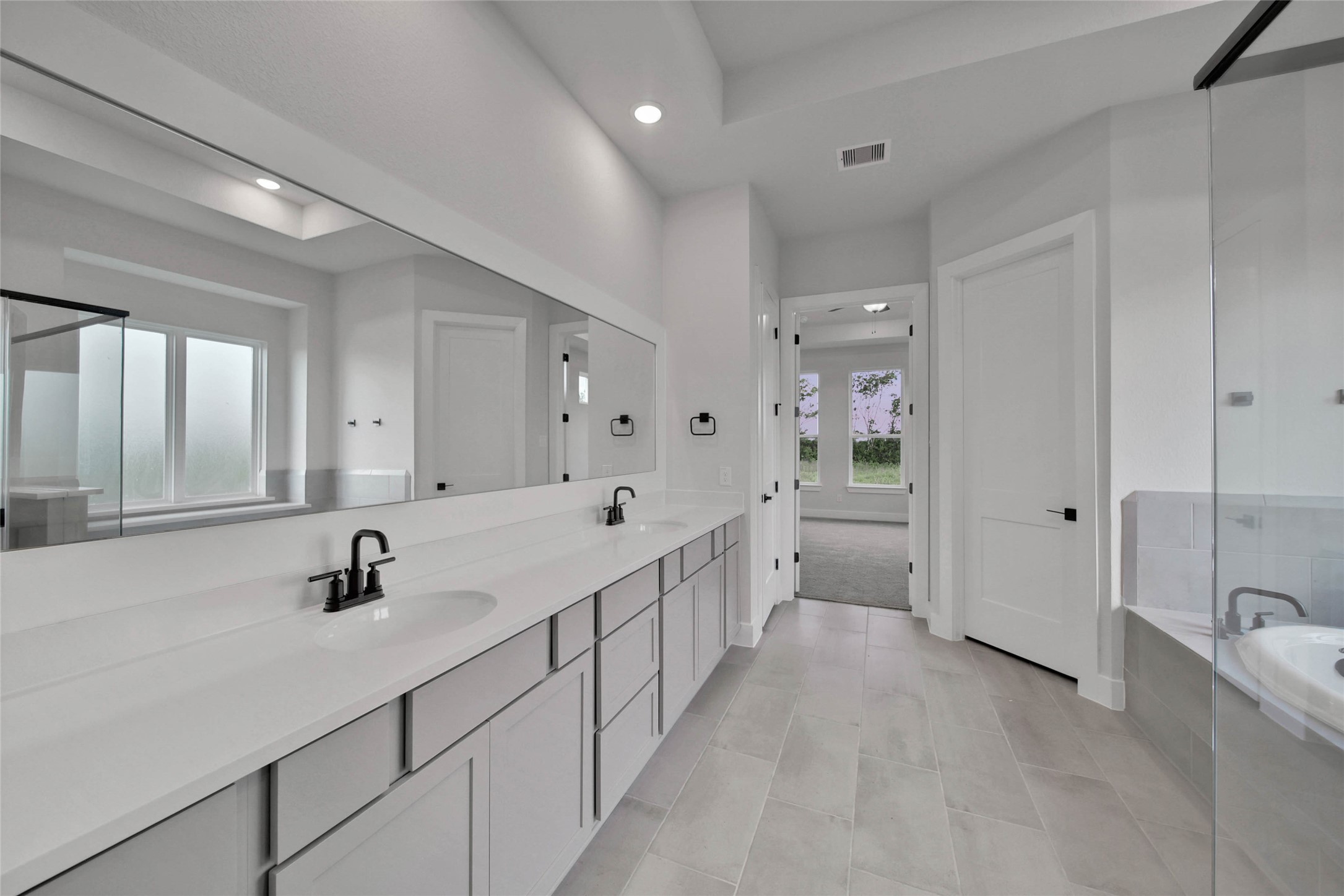 4610 Magnolia Bend Drive Rosharon, TX 77583 - Photo 23 of 48 a kitchen with sink cabinets and window