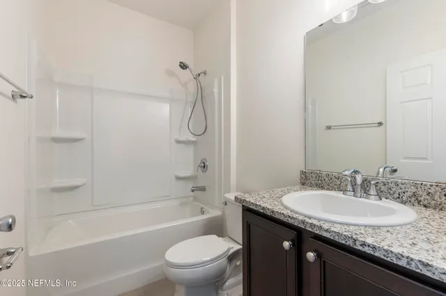 a view of entryway with livingroom