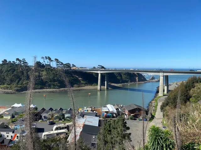 a view of a lake with sitting area