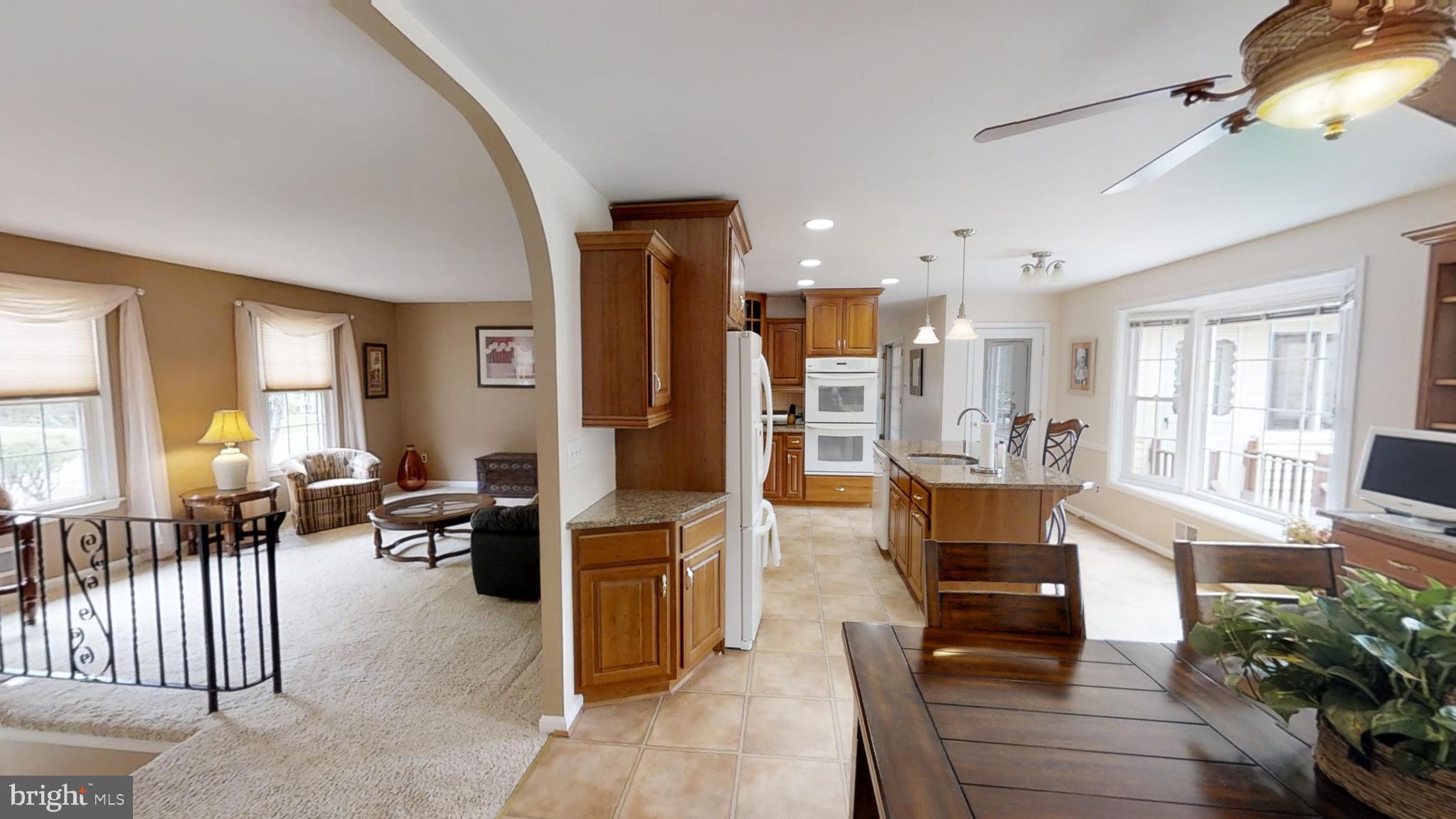 The living room, dining and kitchen area