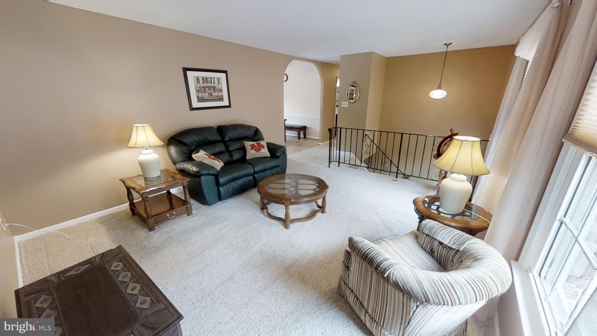 Formal Living room with carpet.