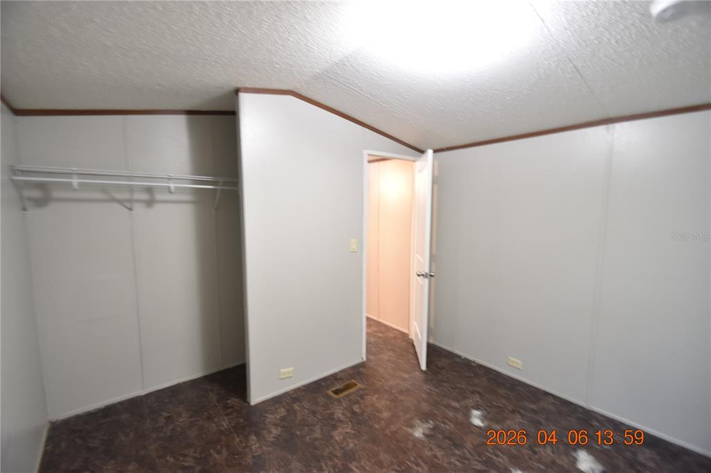 7515 Symmes Road, Unit LOT #5 Gibsonton, FL 33534 - Photo 12 of 23 a view of an empty room