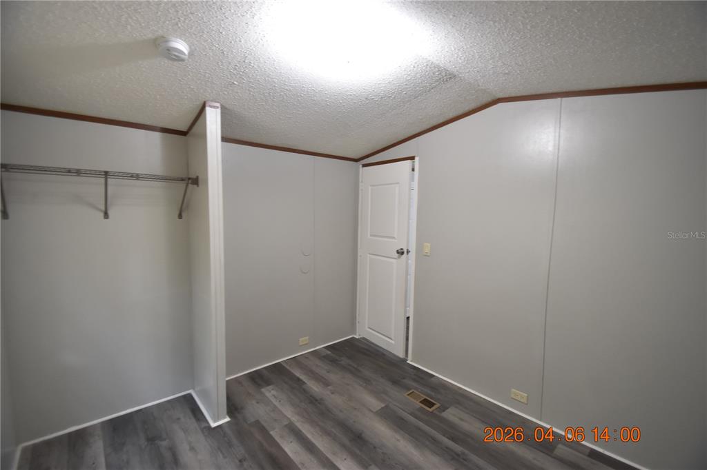 7515 Symmes Road, Unit LOT #5 Gibsonton, FL 33534 - Photo 17 of 23 a view of an empty room