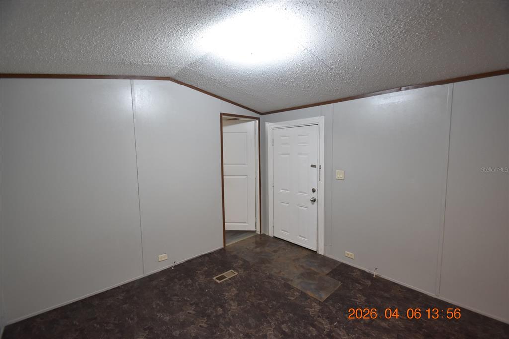 7515 Symmes Road, Unit LOT #5 Gibsonton, FL 33534 - Photo 4 of 23 a view of an empty room