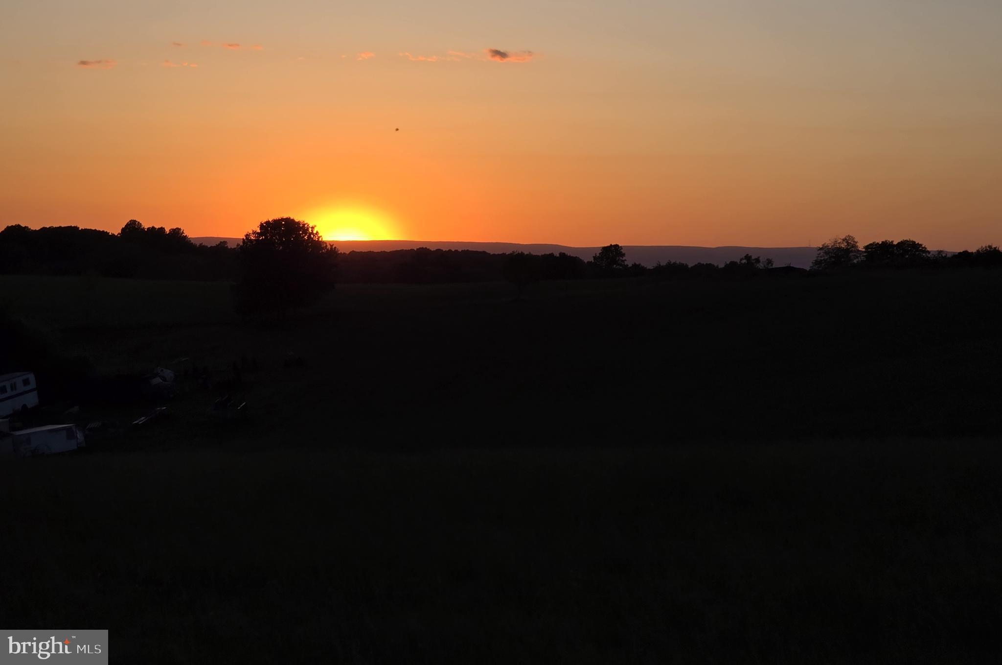5601 Woodville Road Mount Airy, MD 21771 - Photo 54 of 54 a view of a sunset