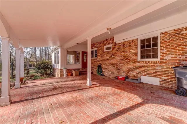a view of a house with a yard and garage