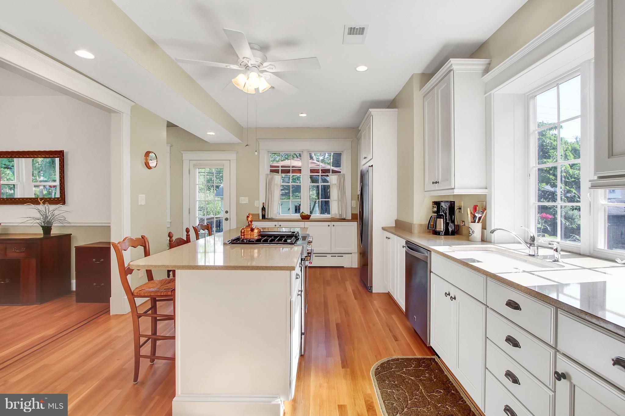 600 Murdock Road Baltimore, MD 21212 - Photo 11 of 30 a large kitchen with kitchen island lots of counter space a sink appliances and a large window