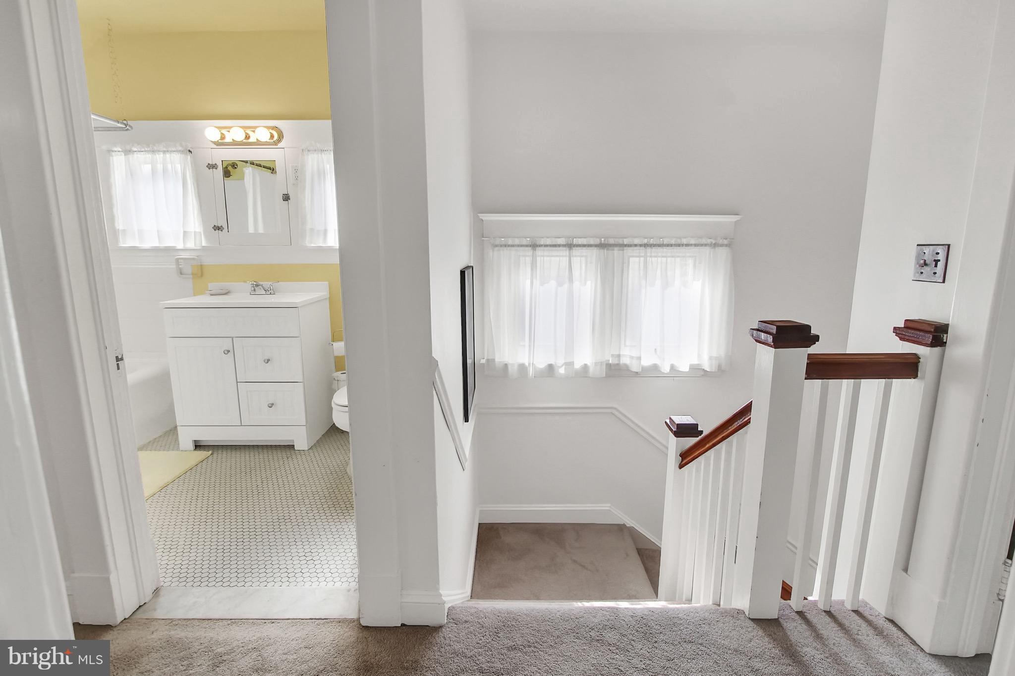 600 Murdock Road Baltimore, MD 21212 - Photo 19 of 30 a view of a hallway with wooden floor and cabinet