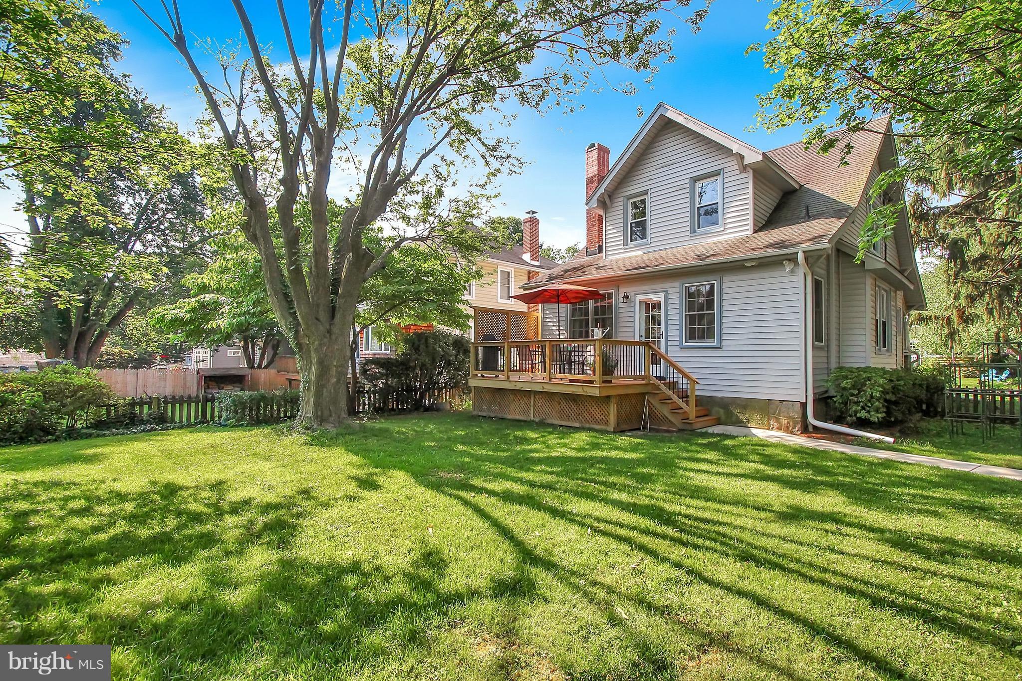 600 Murdock Road Baltimore, MD 21212 - Photo 26 of 30 a view of a house with a big yard and large trees